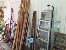 more wood, ladders, yard tools
