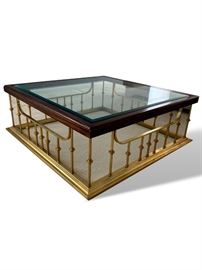 Heavy beveled glass, brass and wood coffee table. Measures 42" x 42" x 18". Shows very light wear.  