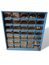 Nuts and screws with storage drawer unit. Good condition. Measures 13” high by 12” across by 6” deep.  