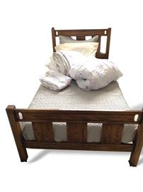 Pair of Twin Beds. Wood shows normal wear.  Right finial missing to one headboard. Sturdy. Headboards measure 42” wide by 37” high – footboards measure 42” wide by 23” high.  