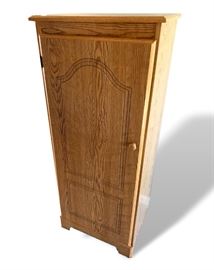 Wooden storage cabinet. Measures 48” High by 20” wide by 15 ½” deep. In very good condition. 