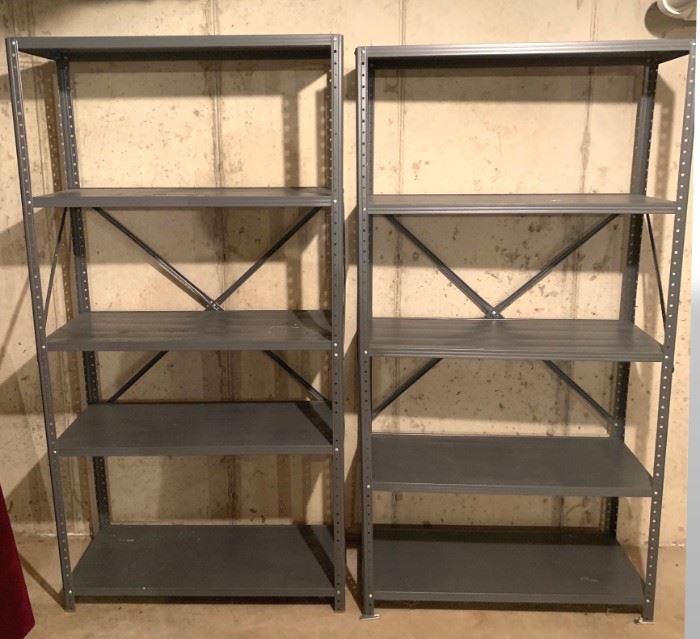 Metal shelving units. Good condition. Each measures approximately 69 ½” tall by 36” wide by 16” deep. 