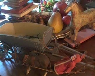 Wagon, sleigh with early hand carved Santa,  antique horse pull you, books, and platters