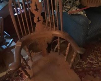 Beautifully high back Windsor arm chair with shaped seat, turned legs, and pierced back slat