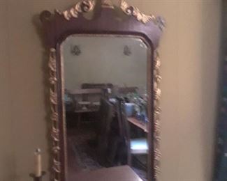 Wood frame mirror with gold leaf embellishment