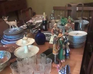 Etched elegant glass set, many sets of plates, holiday figures, sponge ware bowls, and more.
