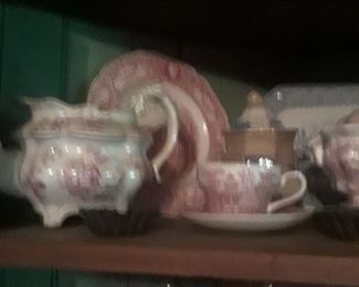 19th century transfer pattern ceramic dinnerware in popular pinks and reds