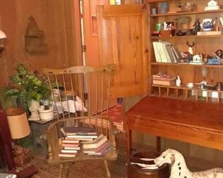 Plantation desk with large Windsor chair on one side