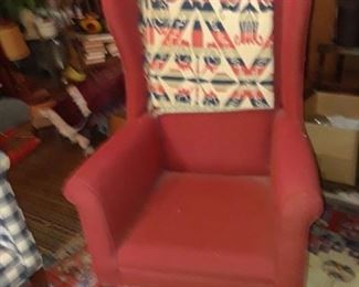 Tall wing chair; woven coverlet