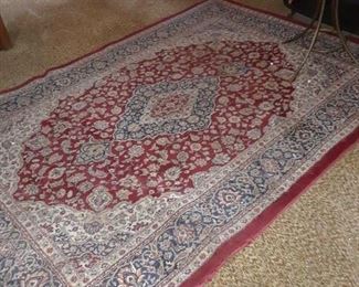 Oriental rug with large red medallion