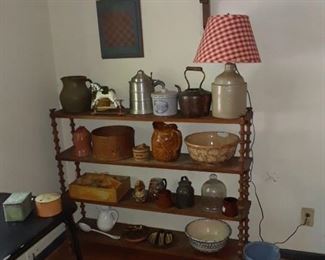 Shelf with lots of crockery, pewter; pottery jugs and spongeware