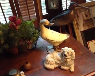 Staffordshire dog, cast iron duck, carved wood shore bird