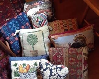 Pillows, some needlepoint and some from antique woven fabric