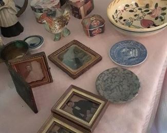 Small boxes, daguerreotypes, dollhouse saucers, and other antique collectibles