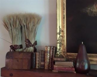 Tea caddies, books, sheaths of wheat