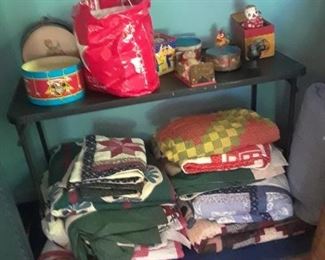 Newer quilts, some for doll beds or baby beds, and a large selection of vintage ones
