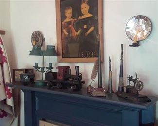Toy sewing machine, old horns, ink well, photo album, tole lampand more