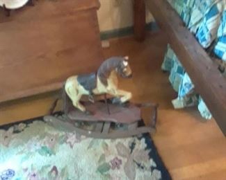 Hooked rug. Toy rocking horse