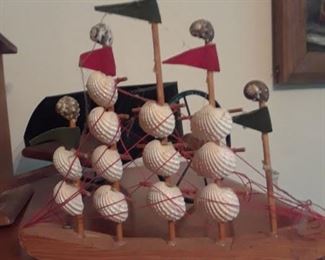 Folkart ship made of shells and wood