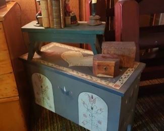 Painted chest; boxes; candlestick; bookends
