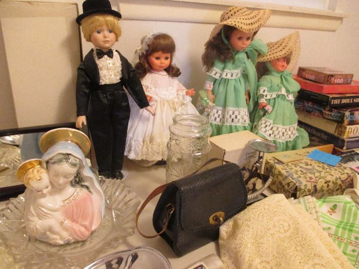 Dolls, Purses, Religious Statuary, and Games