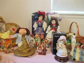 Dolls, dolls, and more dolls, with other assorted ceramics