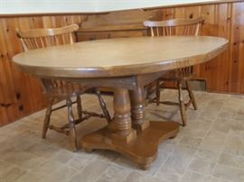 42" Formica top maple table,  with two Captains chairs, two regular chairs and TWO extra leaves. 