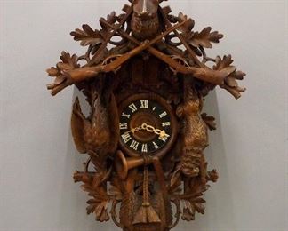 Large Carved Walnut Cuckoo clock with music box