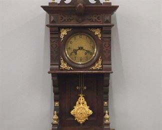 A turn of the century Lenzkirch Open Well wall clock