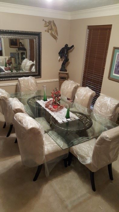 Solid beveled glass large dining table with eight chairs in excellent condition