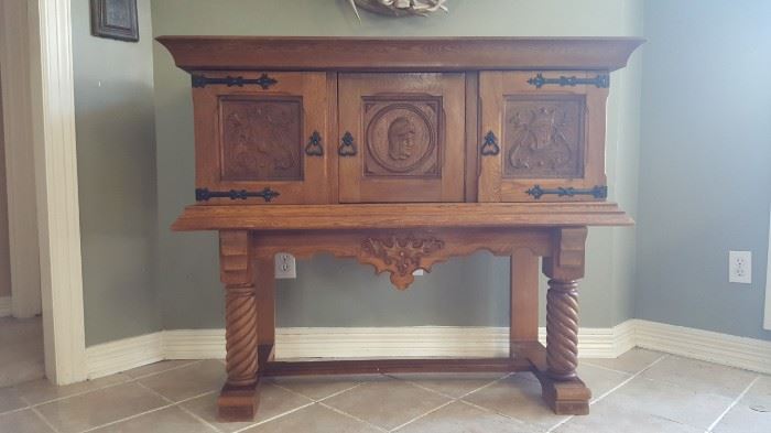 19Th. CENTURY ANTIQUE GORGEOUS RENAISSANCE CASTLE HALLWAY SPANISH OAK, ALL CARVED SIDEBOARD/SERVER/CREDENZA WITH THREE DOORS FROM SPAIN IN GOOD CONDITION WITH SOME WEAR EXPECTED WITH THE AGE AND LOTS OF MOVINGS…THIS FABULOUS PIECE HAS BEEN IN MY FAMILY FOR OVER THREE GENERATIONS. 