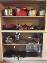 Numerous kitchen pots, pans and bakeware