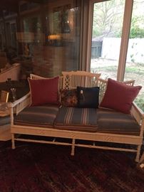 Amazing antique wicker sofa with upholstered cushions