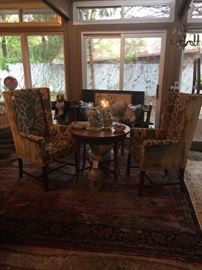 Pair of Hickory Chair arm chairs and antique oak top wicker table
