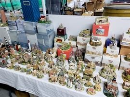 Harbour Lights lighthouses and Lilliput Lane cottages - many still in the boxes!