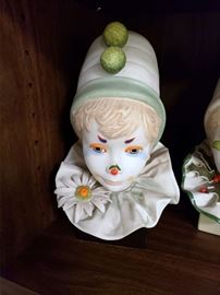 Cybis "Funny Face in Green with Daisy" limited edition 80/150. A special piece produced for a Cybis event held at the Reese Palley store in Atlantic City, NJ in the 1980's.