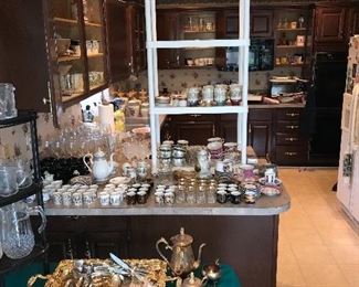 TEA CUPS AND SAUCERS