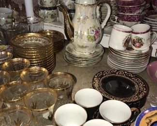 TEA CUPS AND SAUCERS