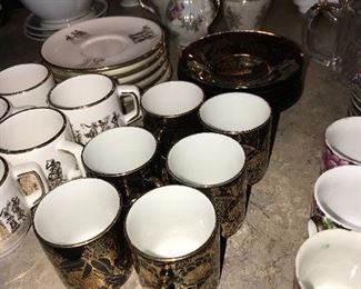 TEA CUPS AND SAUCERS