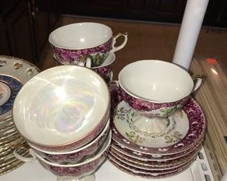 TEA CUPS AND SAUCERS