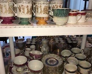 TEA CUPS AND SAUCERS