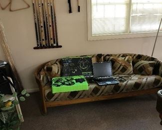 Sofa, Sharper Image Drone, HP Laptop Computer