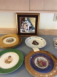 Wide Rimmed Gold Plates and Gold Frame Picture