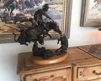 Bronze by Maher Morcos. 20 inches by 24 inches by 20 inches. Low estimate $500