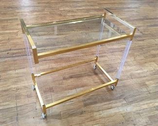Acrylic & brass cart. Low estimate $150
