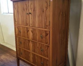 Flamed chest of drawers. Low estimate $250