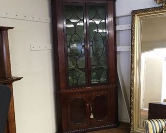 Period corner cabinet. Low estimate $600
