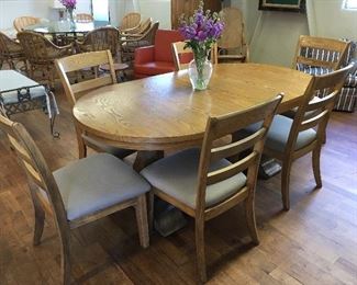 Modern dining table & 6 chairs. Low estimate $350