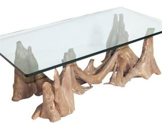 17. Glass Top Driftwood Base Coffee Table
