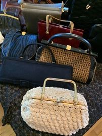Collection of handbags! Leather woven fabrics sequins beads fur and other materials and interesting hardware! 